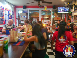 Customers enjoying their visit to Buddy's Bar & Grill Bangkok, Sukhumvit Soi 89